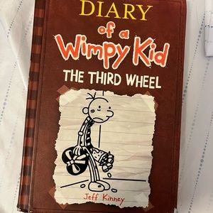 Dairy of wimpy kid book the  third wheel